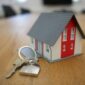Miniature wooden house on a table