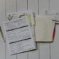 Stack of mortgage paperwork on a desk