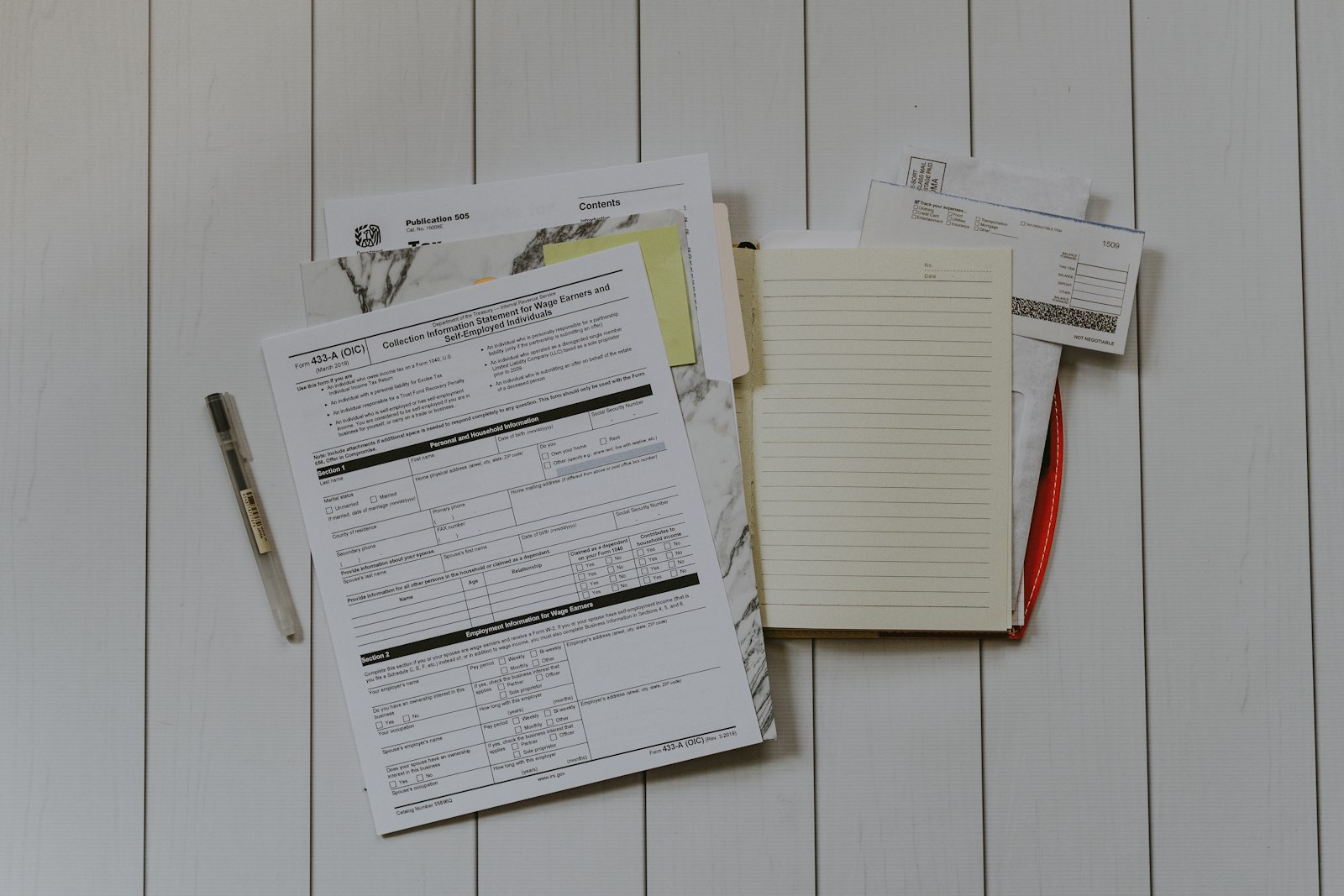 Stack of mortgage paperwork on a desk