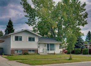 703 Woodpark Boulevard SW, Calgary, Alberta T2W 3M9